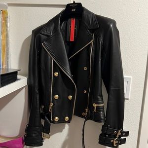 Rare Balmain x H&M one of a kind lamb skin leather jacket with gold hardware.